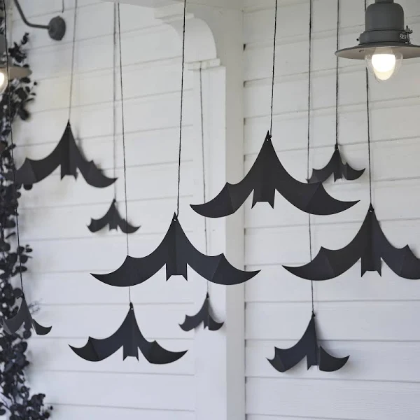 black card hanging bats